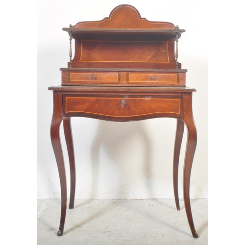 1499 - A 19th century French inlaid bonheur du jour ladies writing desk. The desk having domed gallery back... 