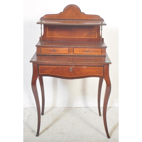 1499 - A 19th century French inlaid bonheur du jour ladies writing desk. The desk having domed gallery back... 