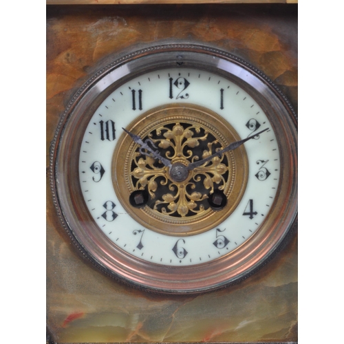 1506 - A 19th century French green and brass onyx mantel striking clock. Of architectural form with an arch... 