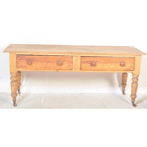 1507 - A large 19th century Victorian pine scullery / refectory dining  table. Raised on turned legs with c... 