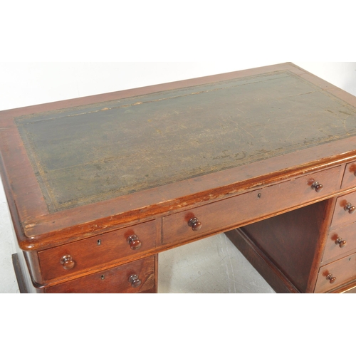 1508 - A Victorian 19th century mahogany and leather twin pedestal office desk. The desk being raised on pl... 