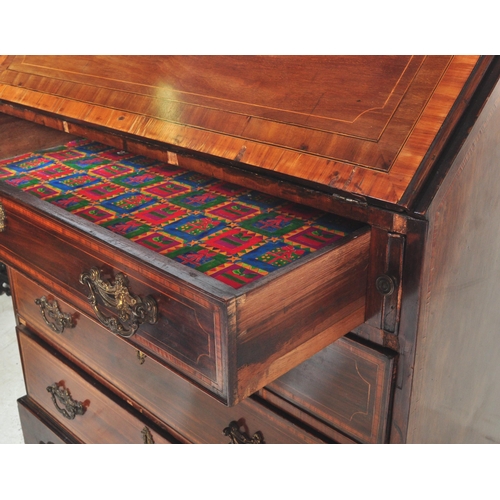 1512 - A 19th century mahogany inlaid bureau. The Bureau having fall front top with central canted string i... 