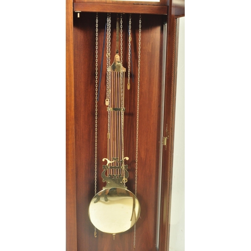 1539 - A 20th century German made reproduction grandfather - longcase clock within a mahogany veneer case w... 