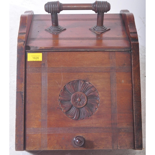 1547 - A Victorian 19th century circa. 1900's Arts and Crafts era mahogany purdonium coal scuttle. The coal... 