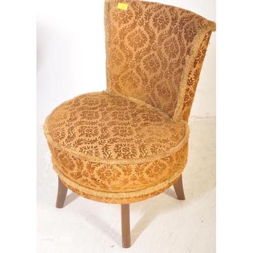 1549 - A mid century circa 1950's bedroom boudoir cocktail chair. The chair being upholstered in a gold dam... 