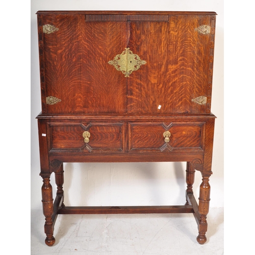 1572 - An early 20th Century, circa 1920's block fronted oak chest on stand / drinks cabinet. Of rectangula... 