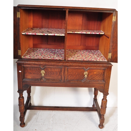 1572 - An early 20th Century, circa 1920's block fronted oak chest on stand / drinks cabinet. Of rectangula... 