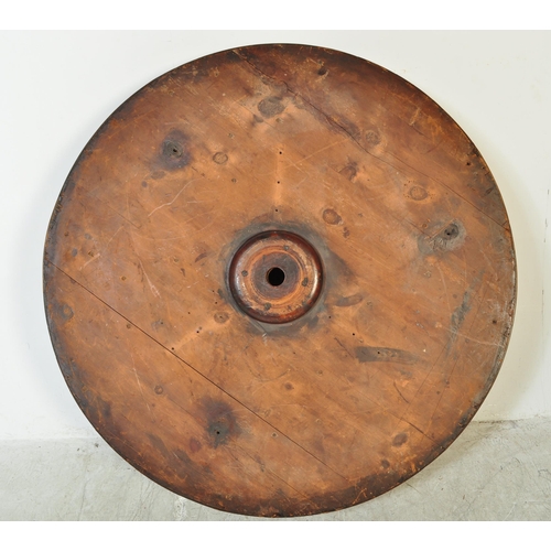 1574 - A late 19th mahogany drum table. With a round circular top, inlaid gilt red leather top with faux dr... 