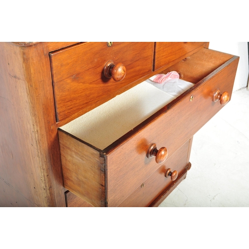 1579 - A Victorian 19th century mahogany 2 over 3 chest of drawers. Raised on a plinth base with short and ... 