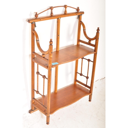 1583 - A Victorian 19th century Aesthetic movement mahogany bamboo effect hanging bookcase. Serpentine shel... 