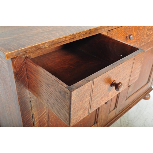 1585 - 1920's solid oak Arts & Crafts - Cotswold School sideboard credenza. Raised on bell feet with a pair... 