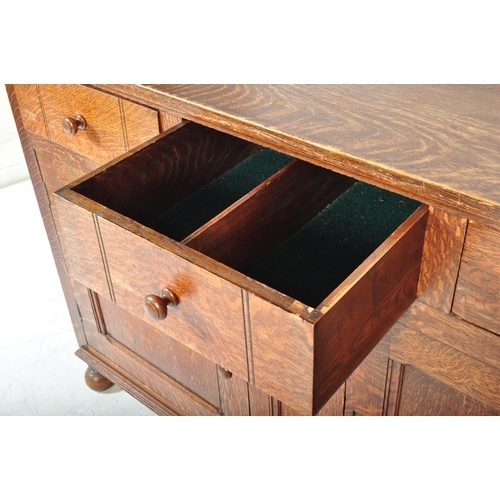 1585 - 1920's solid oak Arts & Crafts - Cotswold School sideboard credenza. Raised on bell feet with a pair... 