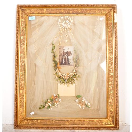 1587 - An early 20th century circa. 1908 German bridal wedding matrimonial wall mounted shadow box having c... 