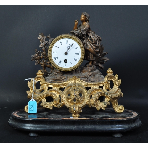 1588 - A 19th century Victorian era mantel clock having white enamel face with roman numeral to chapter rin... 