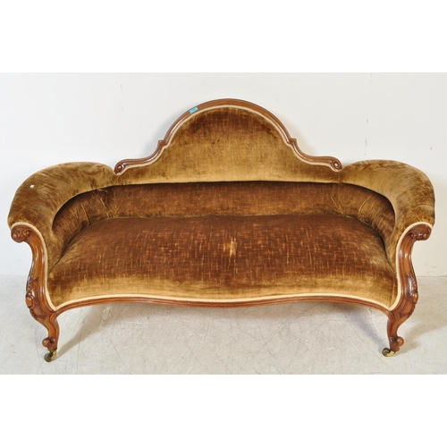 1589 - A Victorian 19th century Chesterfield mahogany double end sofa settee. Raised on shaped legs with ho... 