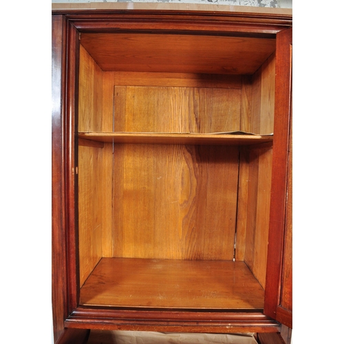 1594 - An  Edwardian mahogany sentry box wardrobe. Of upright form  having cupboard over chest of drawers b... 