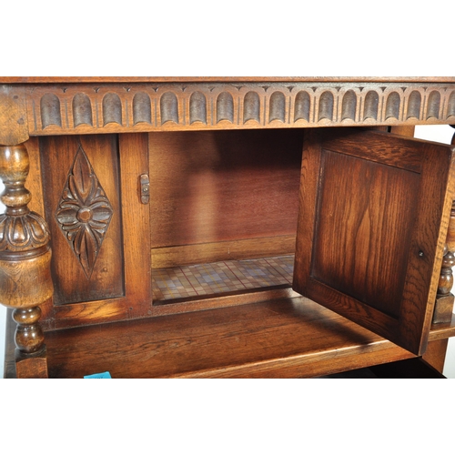 1597 - 20th century Jacobean / Commonwealth revival oak court cupboard of small proportions. Fielded panel ... 