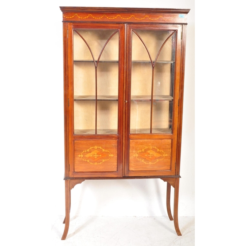 1598 - Edwardian mahogany line inlaid and stencil decorated display cabinet vitrine. Raised on squared legs... 