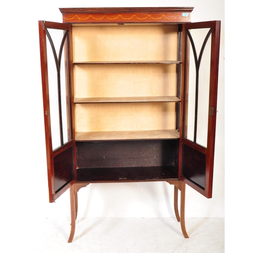 1598 - Edwardian mahogany line inlaid and stencil decorated display cabinet vitrine. Raised on squared legs... 