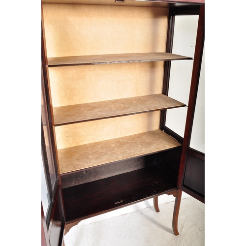 1598 - Edwardian mahogany line inlaid and stencil decorated display cabinet vitrine. Raised on squared legs... 