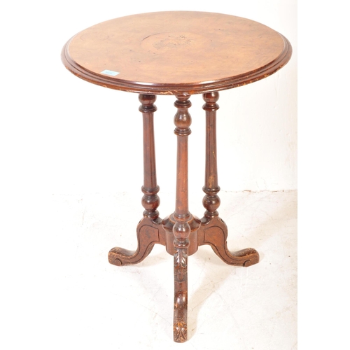 1605 - A 19th century Victorian aesthetic movement side table being raised on turned column supports with s... 