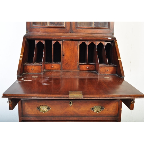 1607 - A 19th Century style revival Queen Anne burr walnut bureau bookcase. Having a double domed top with ... 