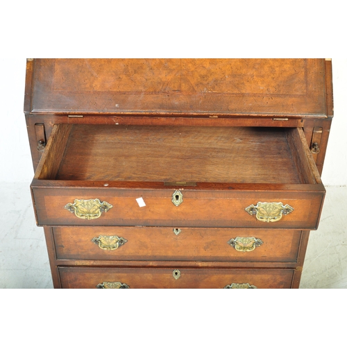 1607 - A 19th Century style revival Queen Anne burr walnut bureau bookcase. Having a double domed top with ... 