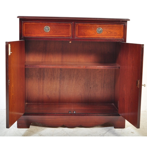 1612 - A 20th Century Regency revival mahogany veneer sideboard. The sideboard having satin wood borders wi... 