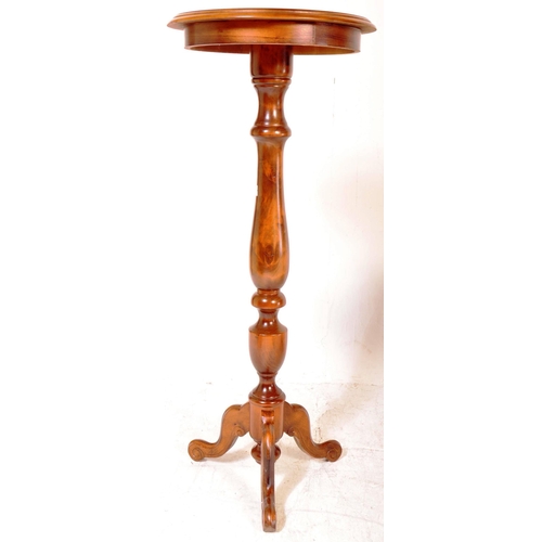 1614 - A vintage 20th Century tripod jardinière / side table together with a similar low coffee table. The ... 