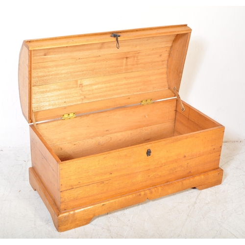 1615 - An early 20th Century pine dome topped trunk chest. The blanket box having a domed top, lock to fron... 