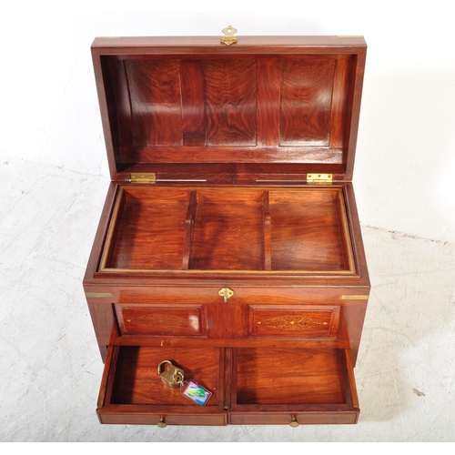 1616 - An Indian teak wood and brass inlaid dome top chest casket. The chest having a panelled dome top wit... 