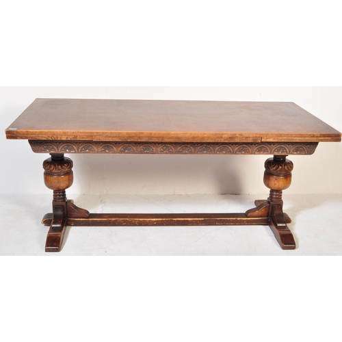 1632 - Large Jacobean revival oak and leather refectory dining room table and chairs - suite. The large ext... 