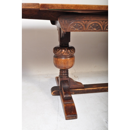 1632 - Large Jacobean revival oak and leather refectory dining room table and chairs - suite. The large ext... 