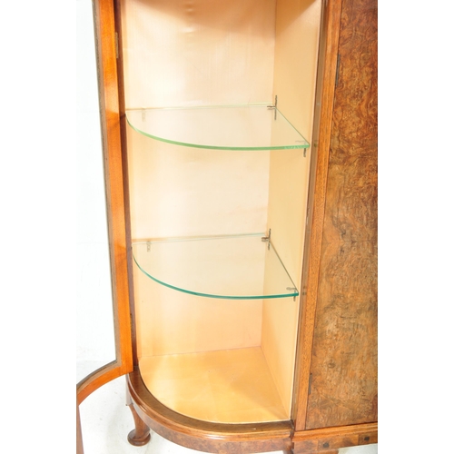 1643 - A vintage 20th century Art Deco circa 1930s burr walnut bow fronted china display cabinet. The displ... 