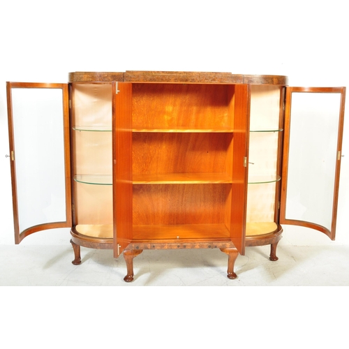 1643 - A vintage 20th century Art Deco circa 1930s burr walnut bow fronted china display cabinet. The displ... 