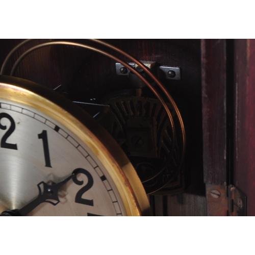 1650 - An early 20th century mahogany cased wall clock. The clock having silvered face with Arabic numeral ... 