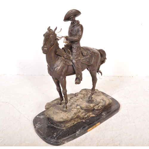 1653 - After Frederick Remington - A large vintage 20th Century bronze of a cowboy on horseback. The horse ... 