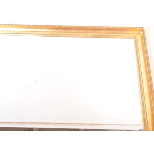 1654 - A large 20th Century vintage gilt mirror. With geometric pattern and beading to inner & outer border... 