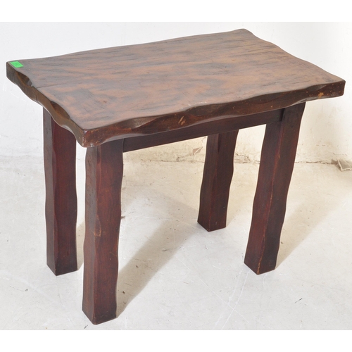 1663 - A 20th century mahogany dining table having solid wood top over square block supports. Measures appr... 