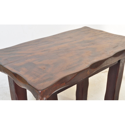 1663 - A 20th century mahogany dining table having solid wood top over square block supports. Measures appr... 