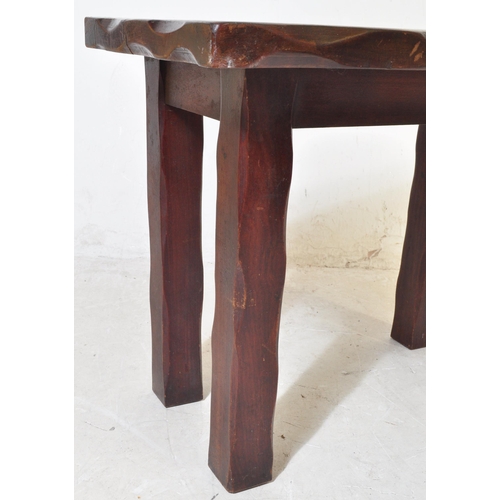 1663 - A 20th century mahogany dining table having solid wood top over square block supports. Measures appr... 