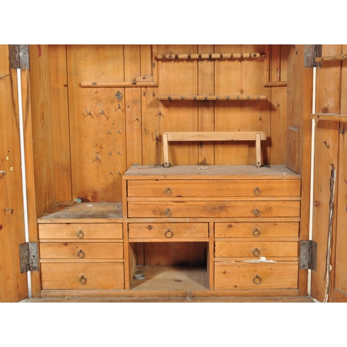 1669 - Victorian 19th century pine estate cupboard bookcase. Raised on plinth base with twin fielded doors ... 