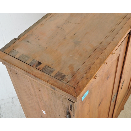 1669 - Victorian 19th century pine estate cupboard bookcase. Raised on plinth base with twin fielded doors ... 