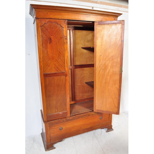 1671 - Edwardian mahogany single wardrobe armoire. Raised on bracket feet with plinth drawer base having ce... 