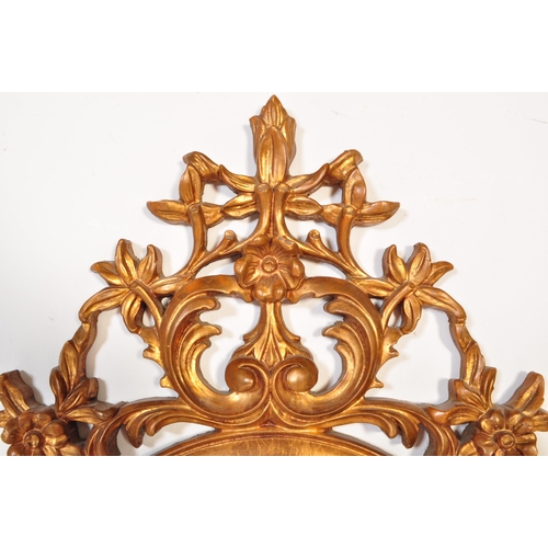 1683 - A large vintage Rococo style over mantle mirror. Heavy sculpted plaster frame with vine and scrollwo... 