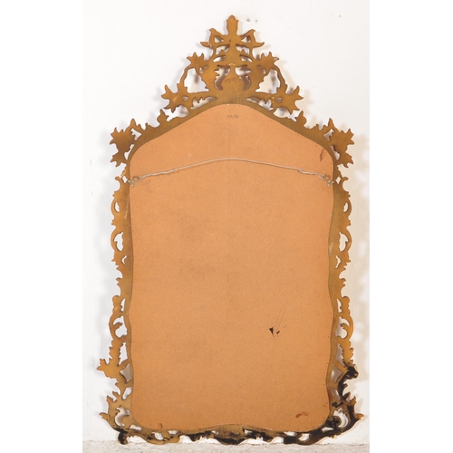 1683 - A large vintage Rococo style over mantle mirror. Heavy sculpted plaster frame with vine and scrollwo... 