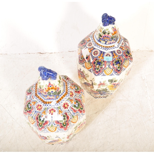 1684 - A pair of 20th vintage Century Dutch Delft hand painted porcelain chinoiserie style lidded urn vase ... 