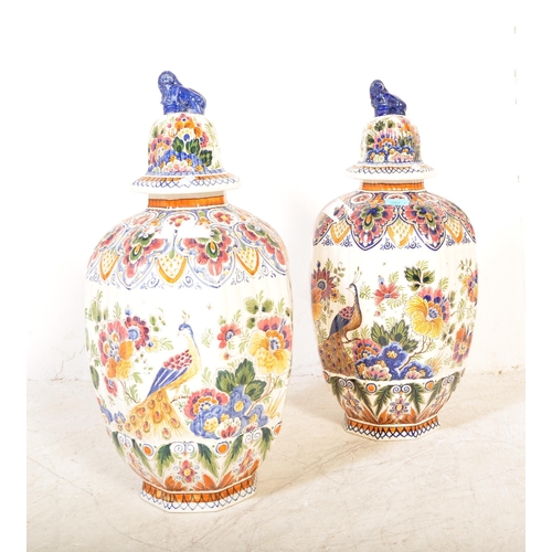 1684 - A pair of 20th vintage Century Dutch Delft hand painted porcelain chinoiserie style lidded urn vase ... 