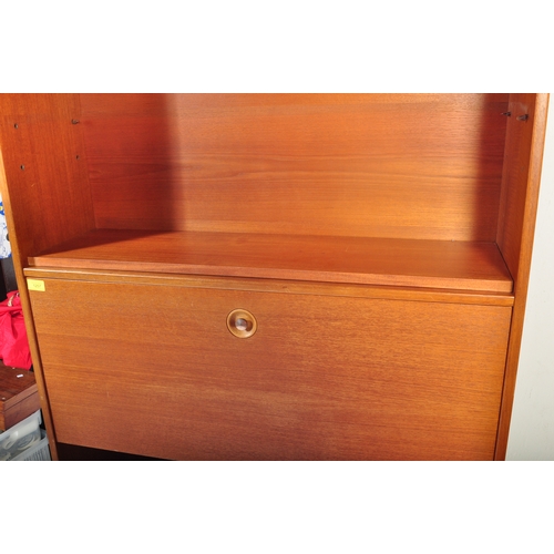 1243 - Mid century teak wood upright drinks cabinet with fall front centre over cupboard to the base with p... 