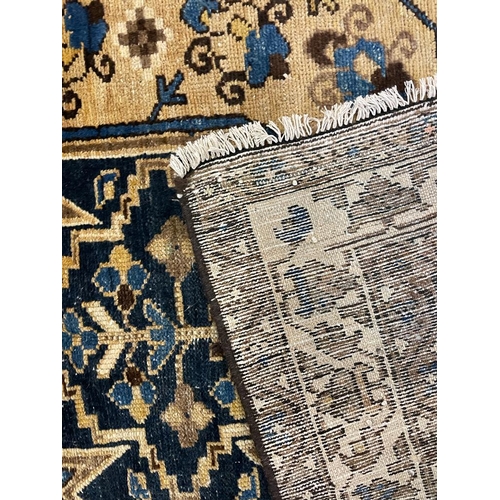 1546 - An early 20th century Persian Islamic Northwest Mazlaghan floor carpet rug having cream & cobalt blu... 